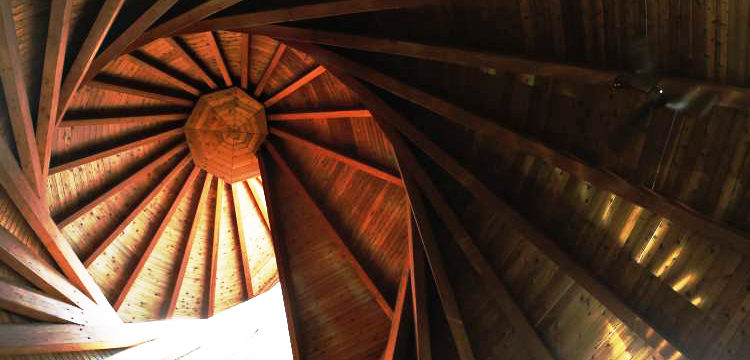 Looking up through the spiral cedar spire from inside Precious Blood Roman Catholic Church, designed by Etienne Gaboury. (Janek Lowe/Winnipeg Free Press)